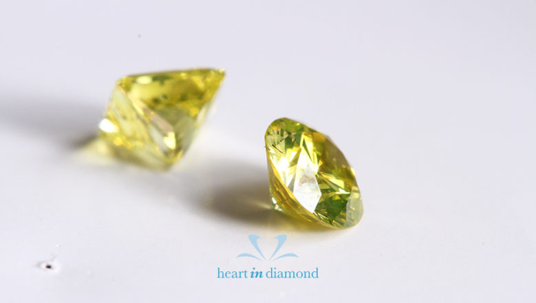 One Pear cut and one round brilliant cut yellow diamonds made from ashes