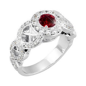 This antique four-prong Halo ring