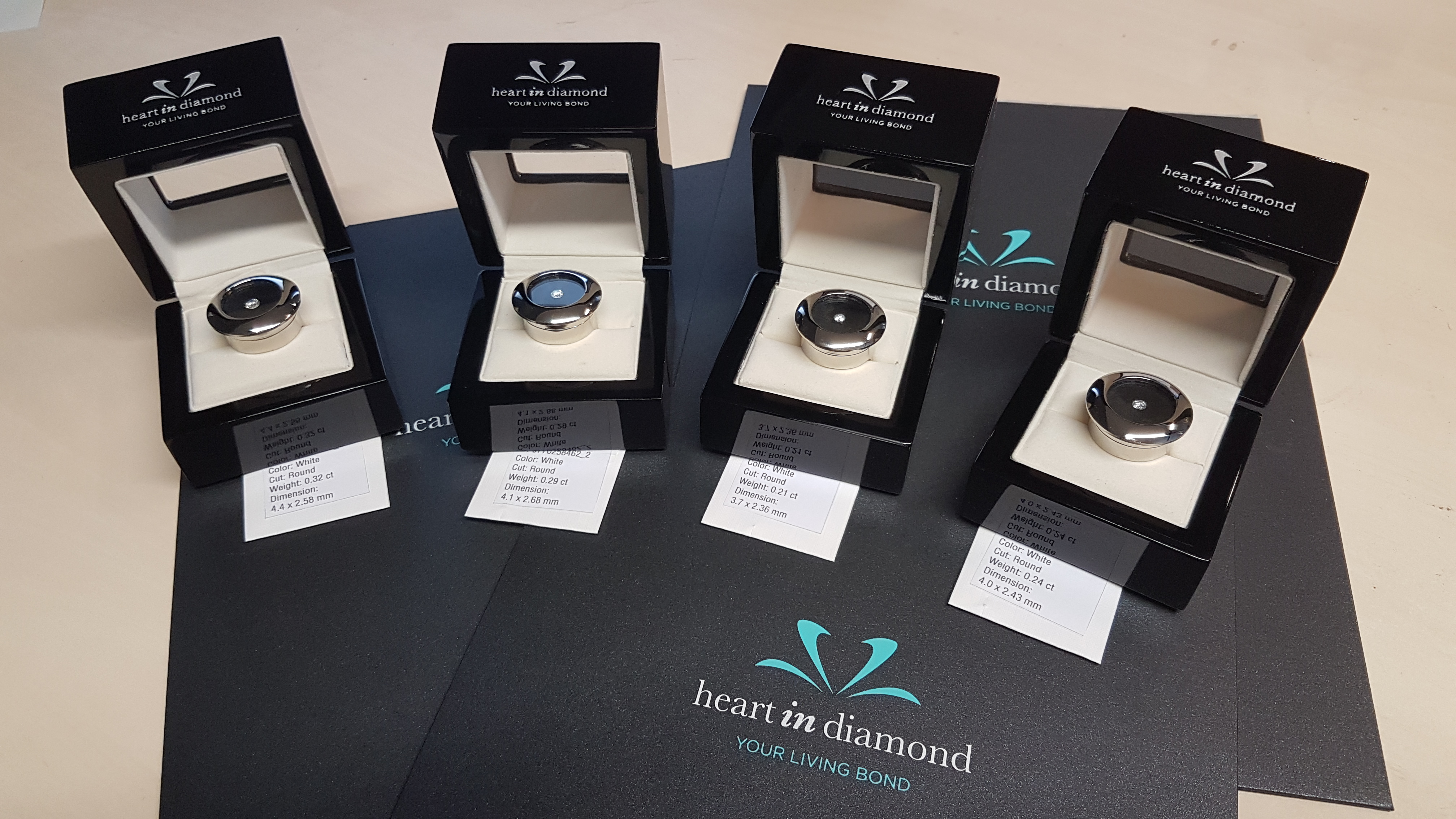 four white diamonds fully packed with the certificates